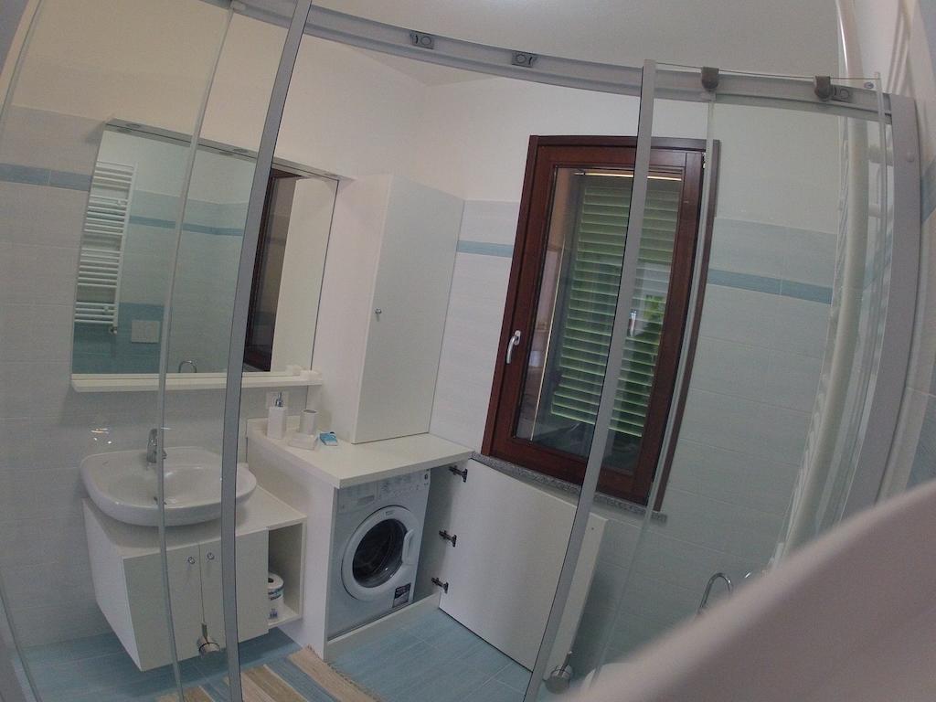 Il Nuovo Palazzotto Διαμέρισμα Στρέσα Δωμάτιο φωτογραφία